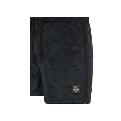 STONE ISLAND NYLON GARMENT DYED SWIM SHORTS IN BLACK