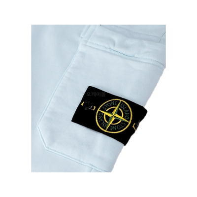 STONE ISLAND LOGO BADGE TRACKSUIT BOTTOMS IN SKY BLUE